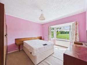 Bedroom One- click for photo gallery